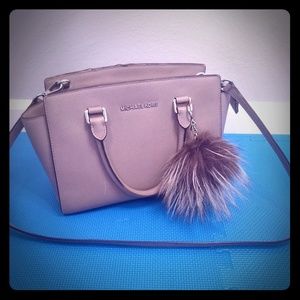 Michael's Kors Purse with puff ball